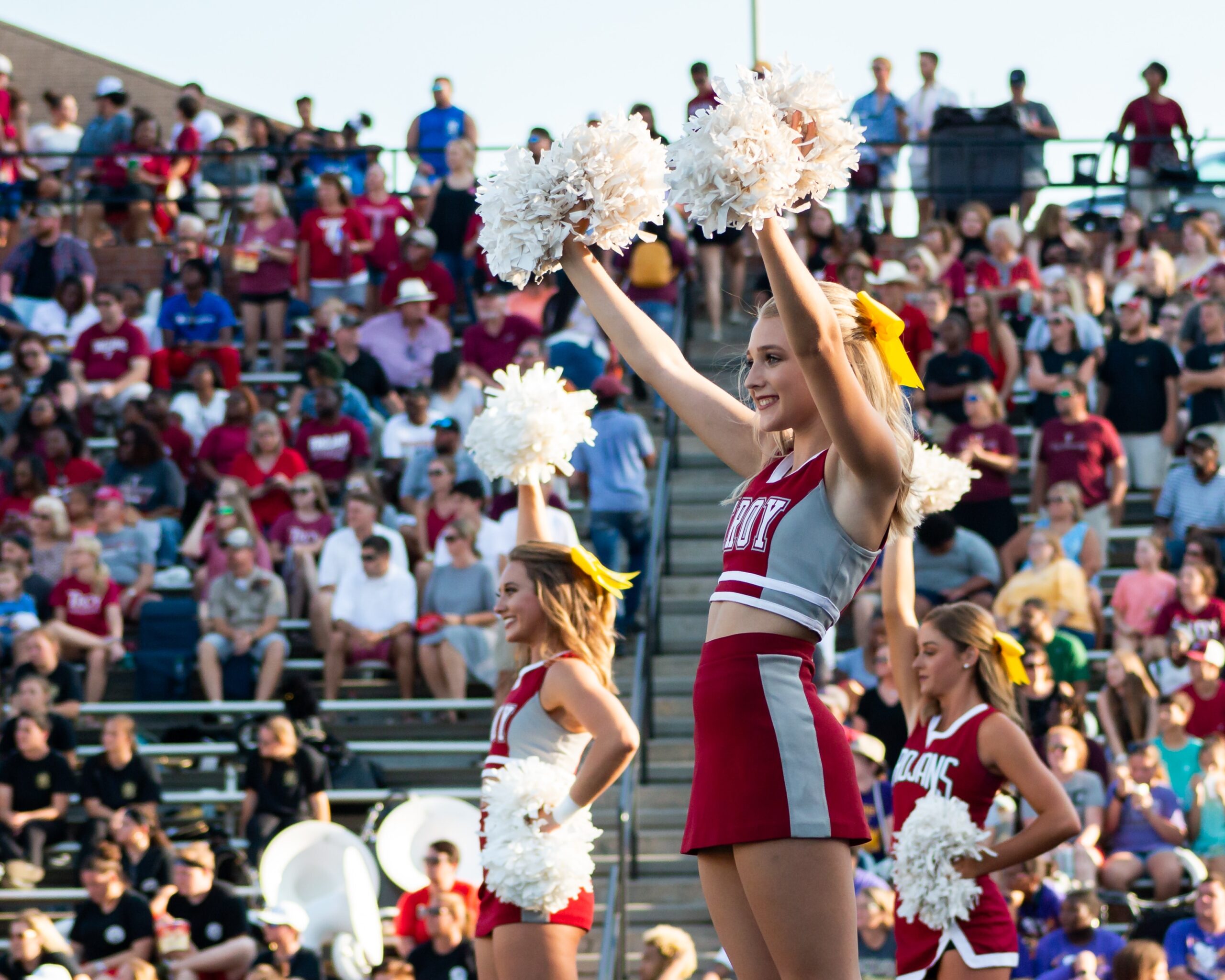 Cheerleader has postural issues.